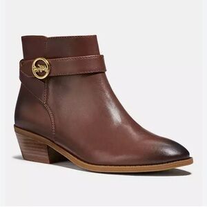 Coach Dylan Horse and Carriage bootie in walnut leather. Inner zipper. Size 5.5